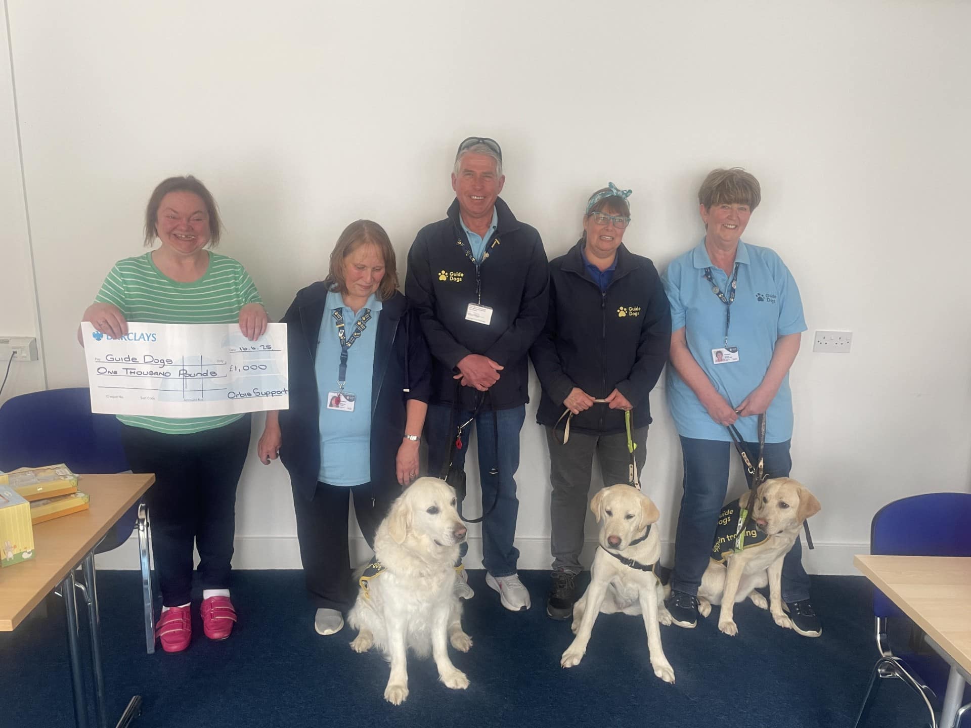 People standing with guide dogs